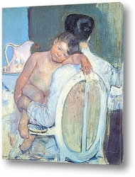   Сидящая женщина с ребенком и его рукой
