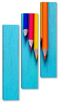 Модульная картина цветные карандаши на голубом деревянном фоне